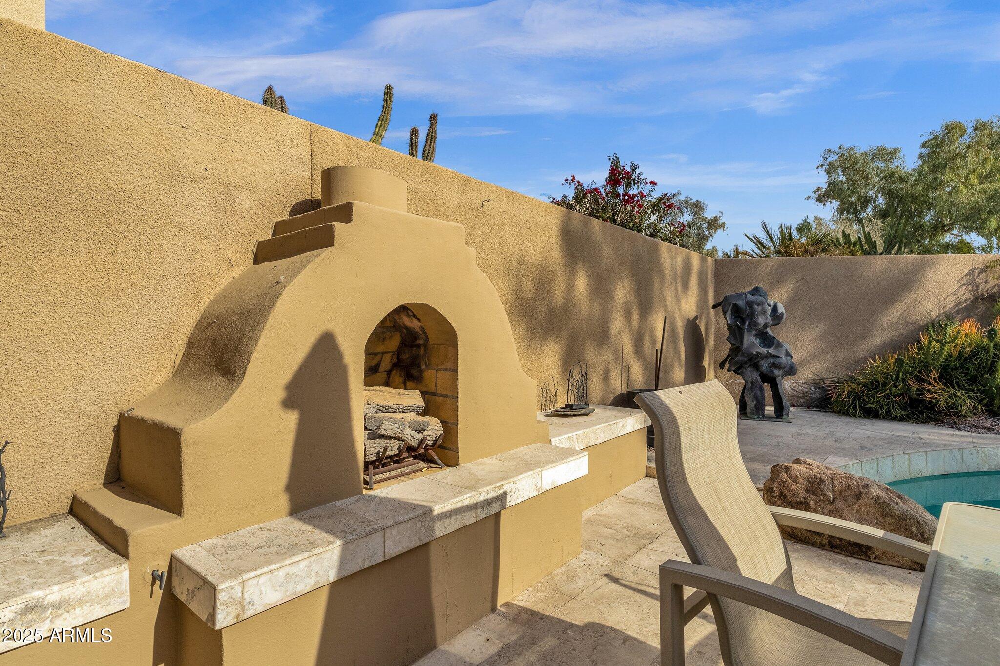 7740 East Gainey Ranch Road, Unit 36 Scottsdale, AZ 85258 - Photo 34 of 54 a view of outdoor seating space