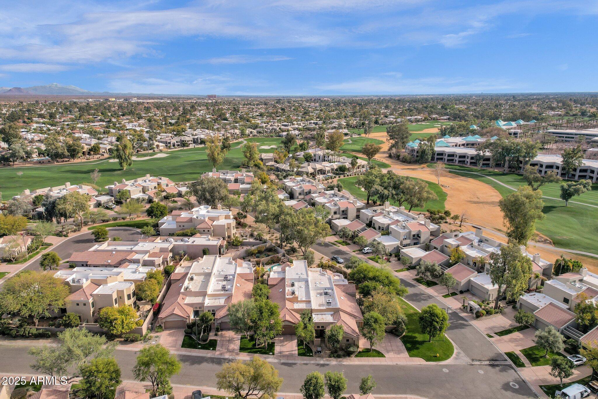 7740 East Gainey Ranch Road, Unit 36 Scottsdale, AZ 85258 - Photo 37 of 54 an aerial view of a city