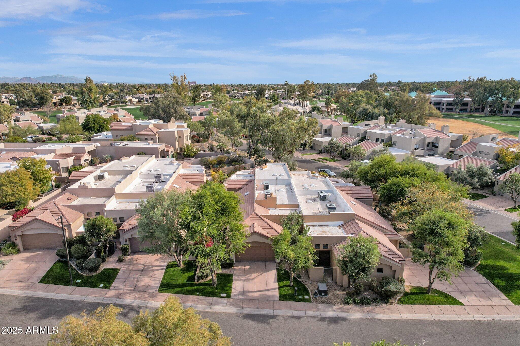 7740 East Gainey Ranch Road, Unit 36 Scottsdale, AZ 85258 - Photo 39 of 54 an aerial view of a city