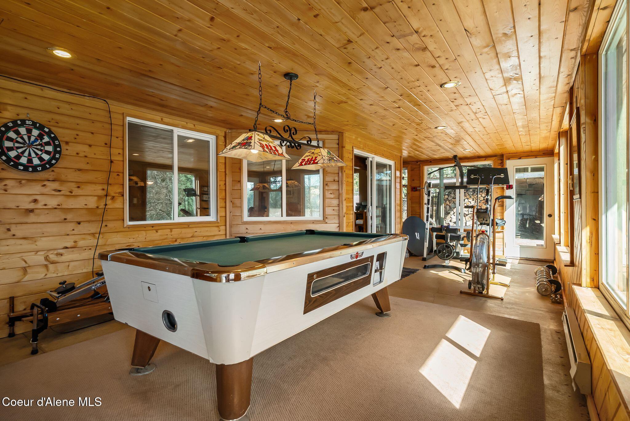 338 Steep Lane Cocolalla, ID 83813 - Photo 39 of 73 Sunroom with pool table