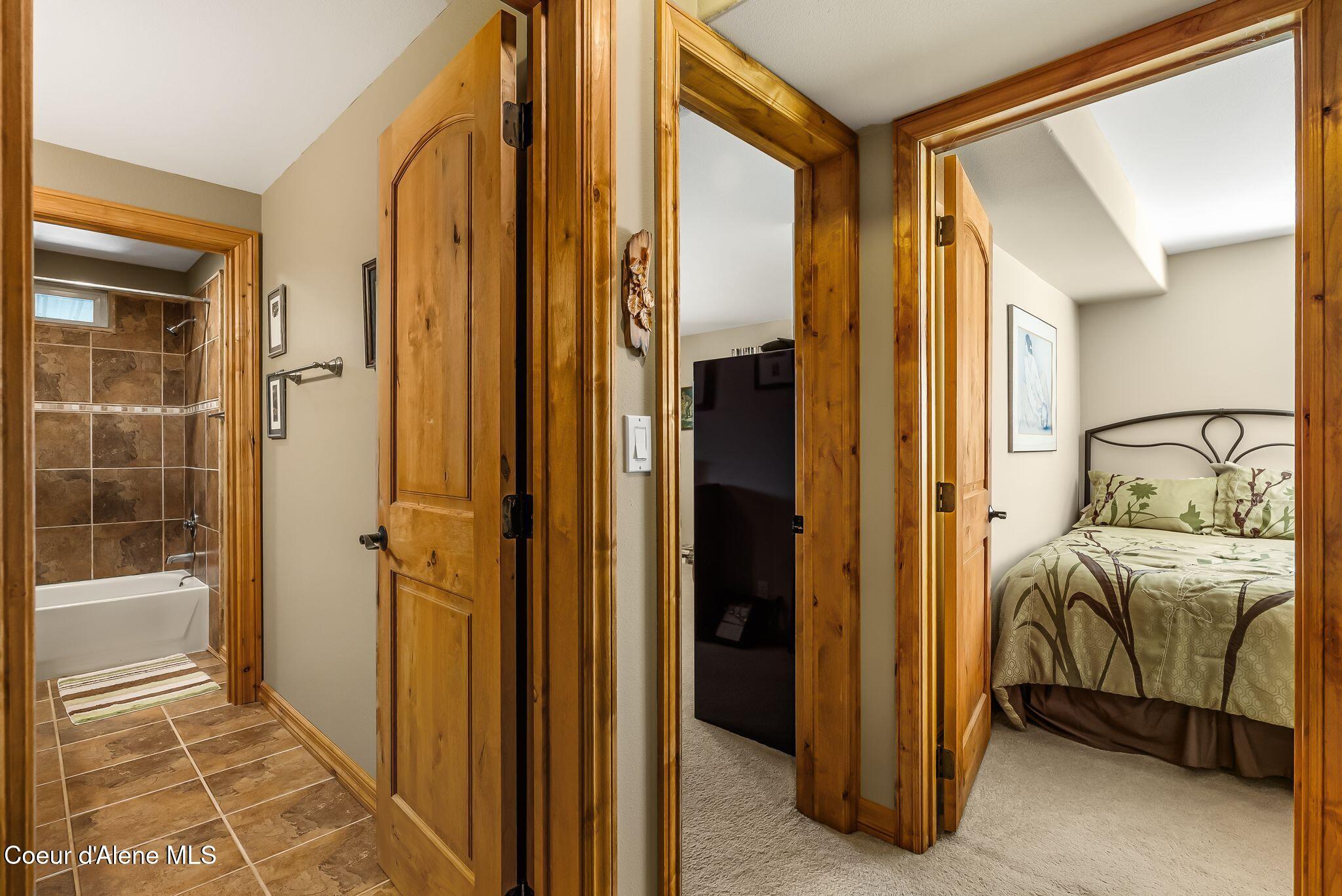 338 Steep Lane Cocolalla, ID 83813 - Photo 40 of 73 Looking at guest bathroom and bedroom