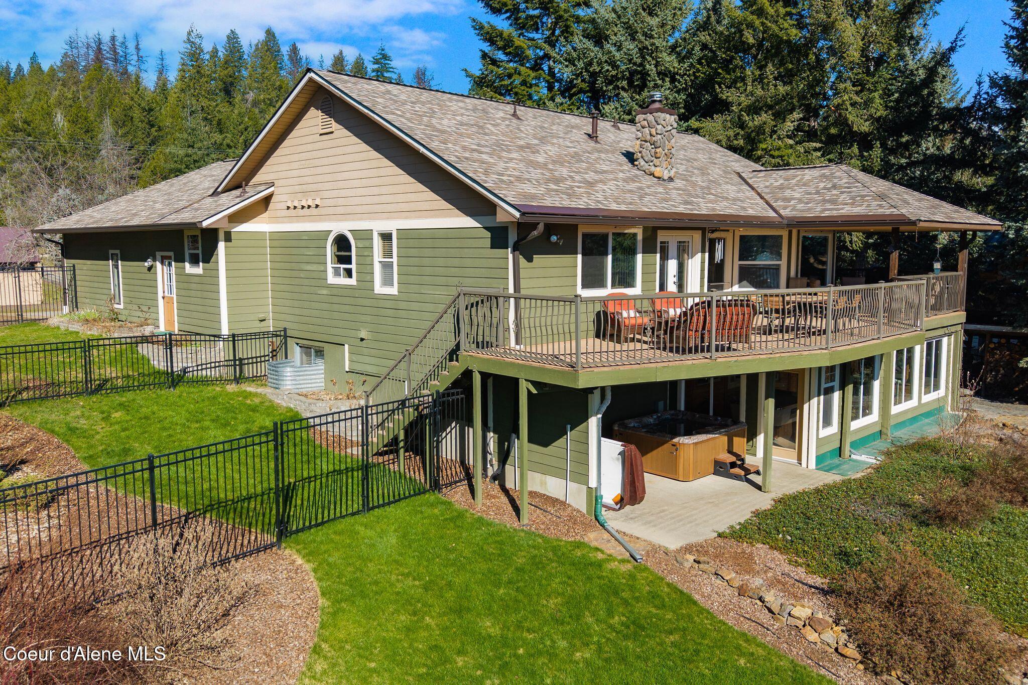 338 Steep Lane Cocolalla, ID 83813 - Photo 8 of 73 Entertaining covered & open deck