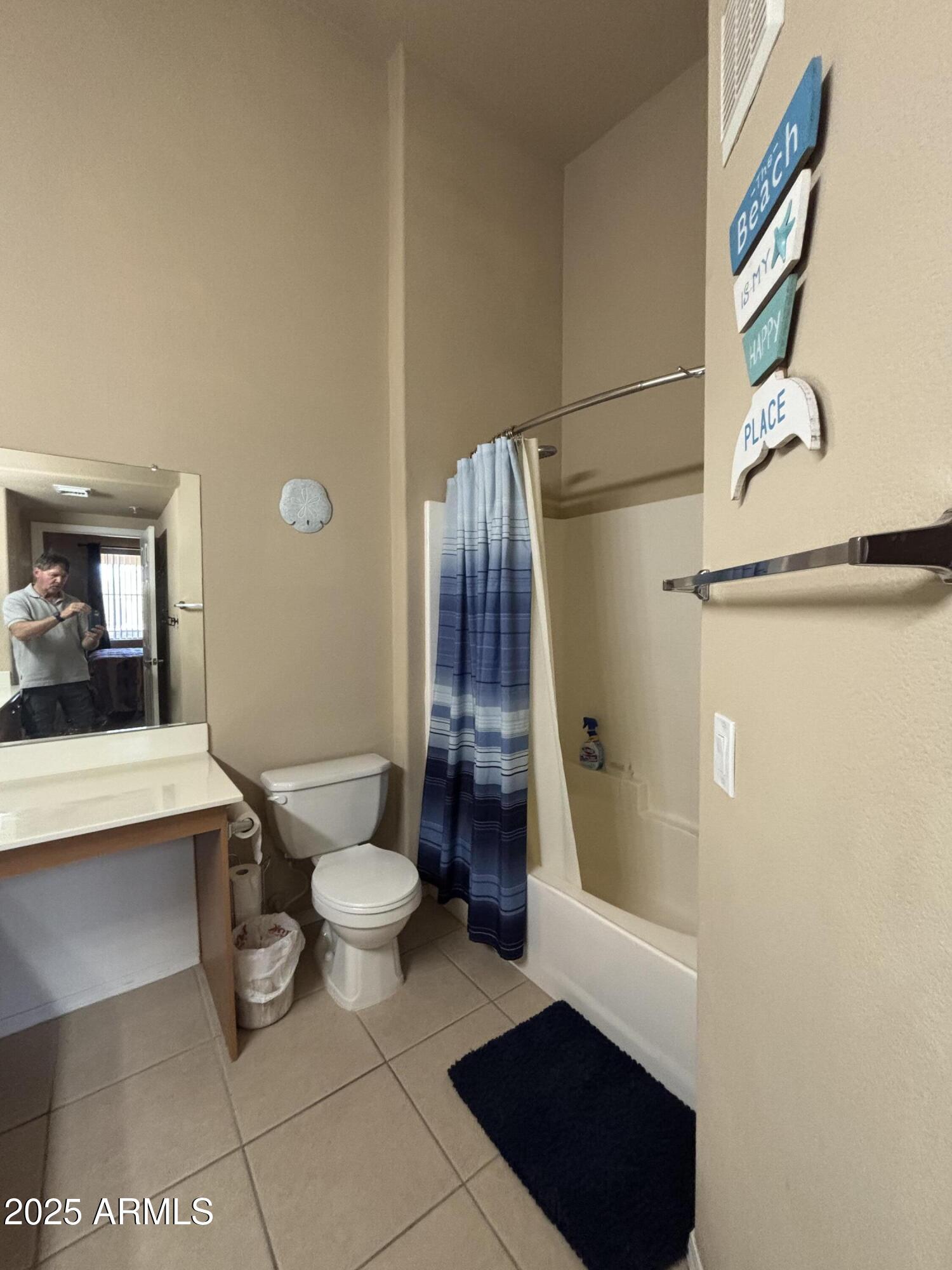 10136 East Southern Avenue, Unit 2048 Mesa, AZ 85209 - Photo 15 of 23 a bathroom with a toilet and a shower