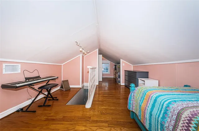 a bed room with a bed and furniture