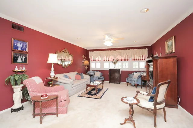 a kitchen with stainless steel appliances a stove a sink and a refrigerator