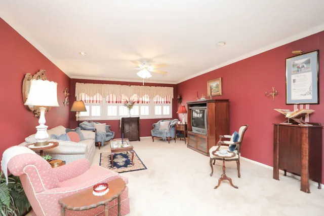 a kitchen with stainless steel appliances granite countertop a refrigerator stove and sink