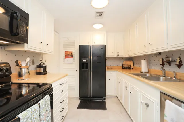 a view of parking garage with cars