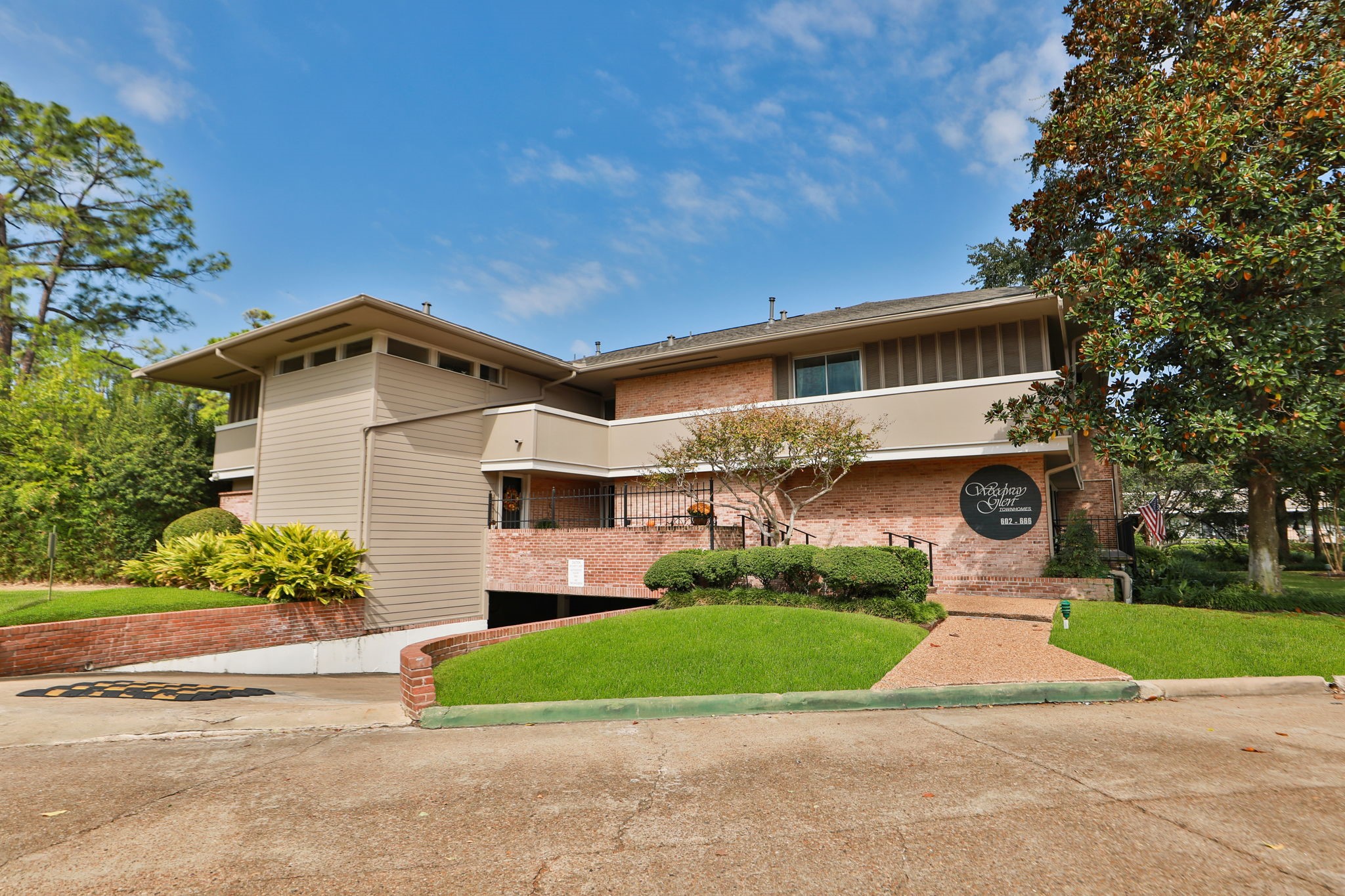 666 South Ripple Creek Drive, Unit 666 Houston, TX 77057 - Photo 36 of 49 a front view of house with yard and green space