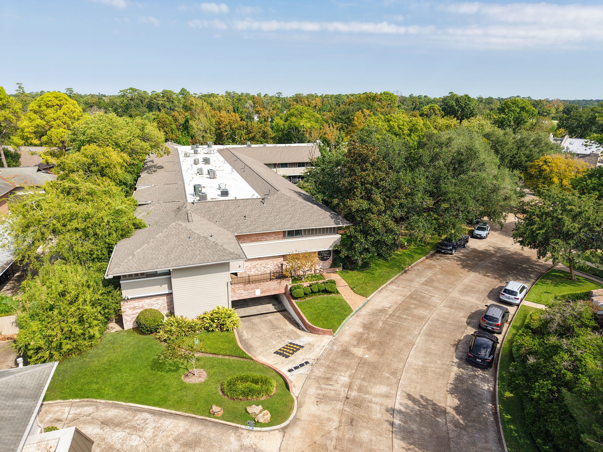 666 South Ripple Creek Drive, Unit 666 Houston, TX 77057 - Photo 43 of 49 an aerial view of a house with garden space and street view