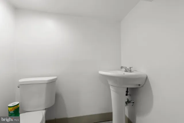 a bathroom with a sink and a toilet