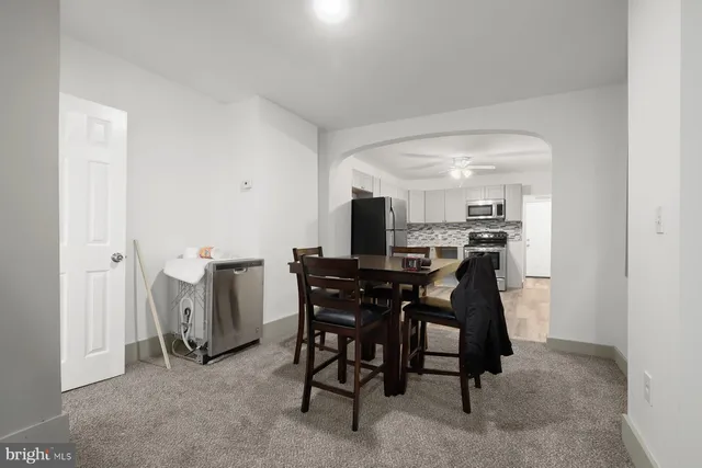 a view of a dining room with furniture