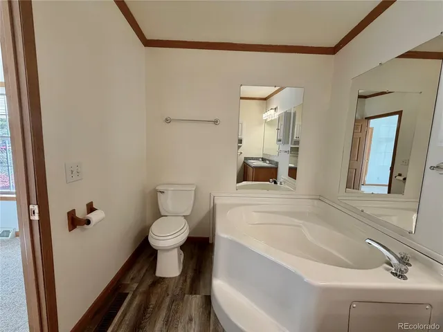 a bathroom with a sink and a toilet