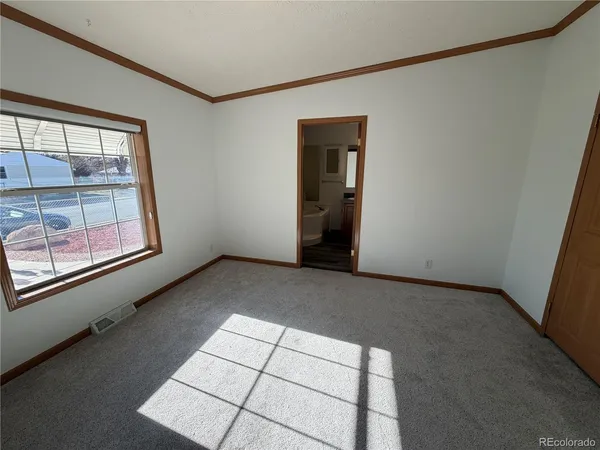 an empty room with windows