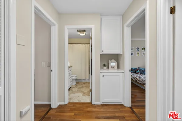 a view of a bedroom from a hallway