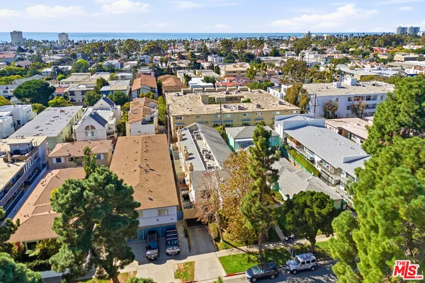 an aerial view of a city with lots of residential buildings