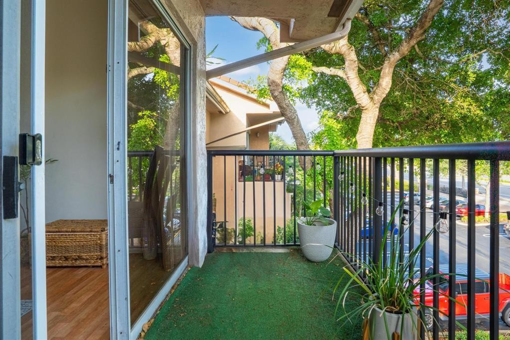 8851 Wiles Road, Unit 305 Coral Springs, FL 33067 - Photo 13 of 17 a view of a balcony with lake view