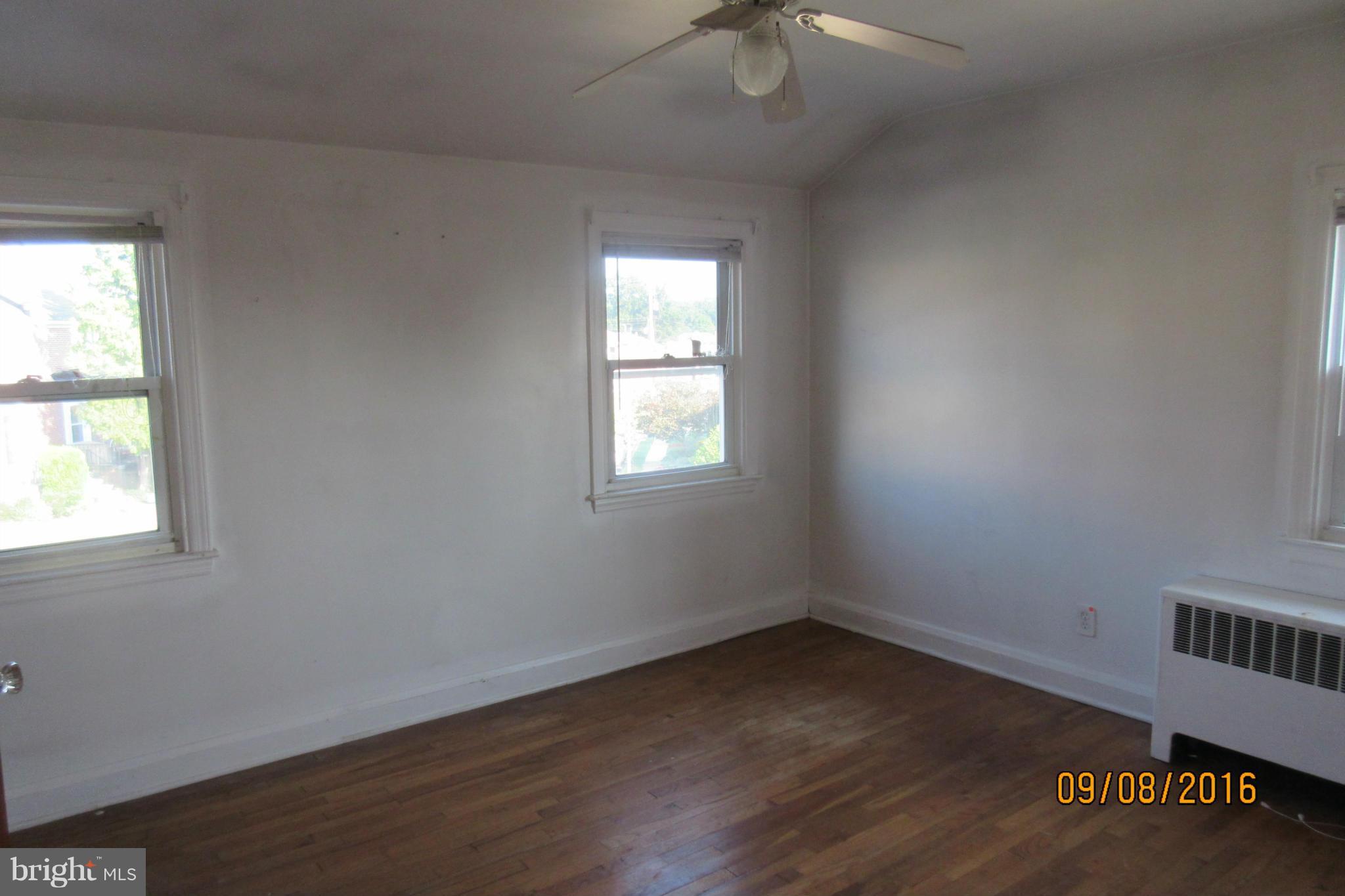 3919 Colchester Road Baltimore, MD 21229 - Photo 10 of 13 an empty room with a window