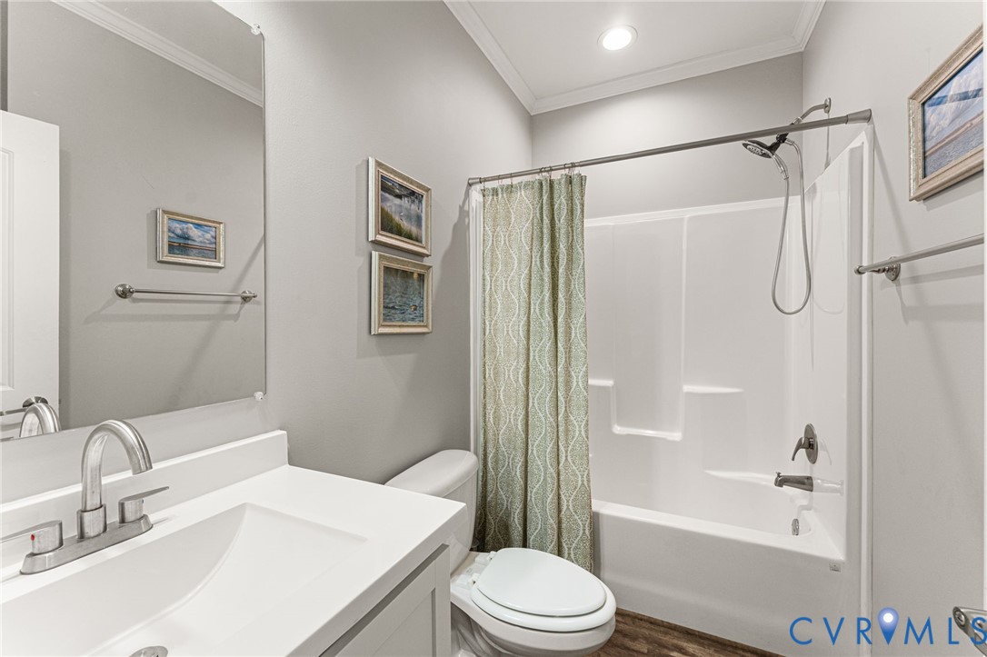 613 Doctors Point Road Lottsburg, VA 22511 - Photo 34 of 50 a bathroom with a sink toilet and shower