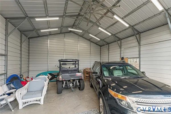 a backyard of a house with outdoor seating