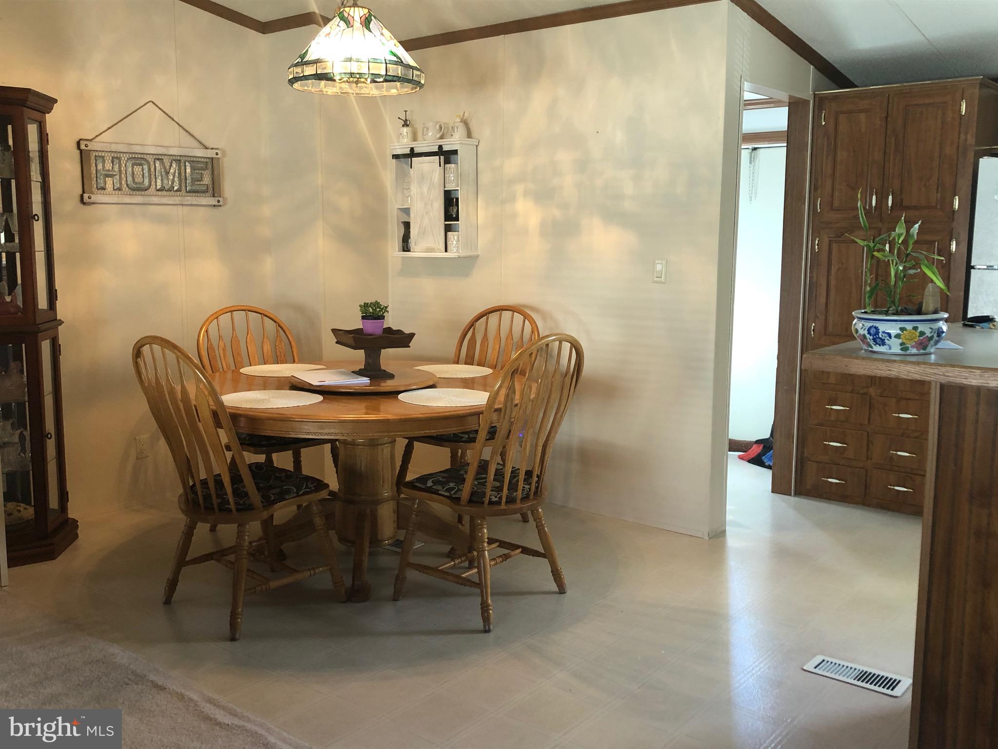16937 Alcott Road Hagerstown, MD 21740 - Photo 19 of 36 large dining area off of kitchen
