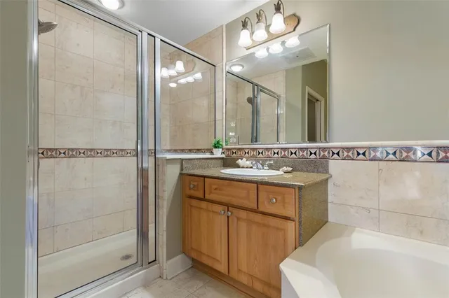 a bedroom with bed and a window