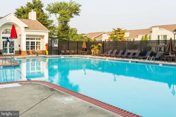 a view of a chairs and table on the terrace
