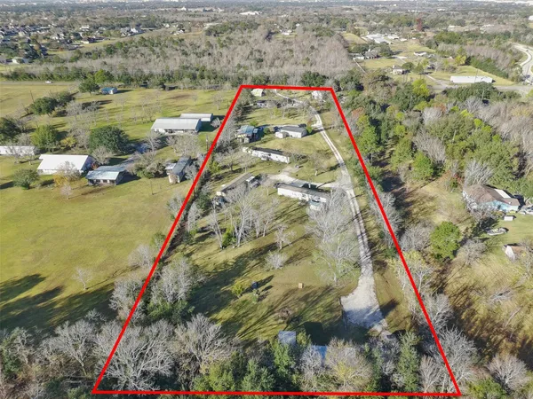 a view of a yard with an outdoor space