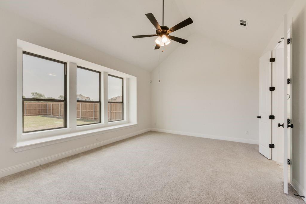 511 San Angelo Drive Forney, TX 75126 - Photo 14 of 34 a view of an empty room with a window