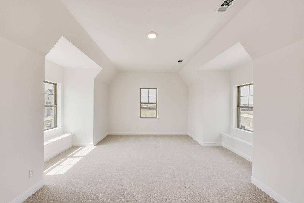 511 San Angelo Drive Forney, TX 75126 - Photo 26 of 34 an empty room with windows