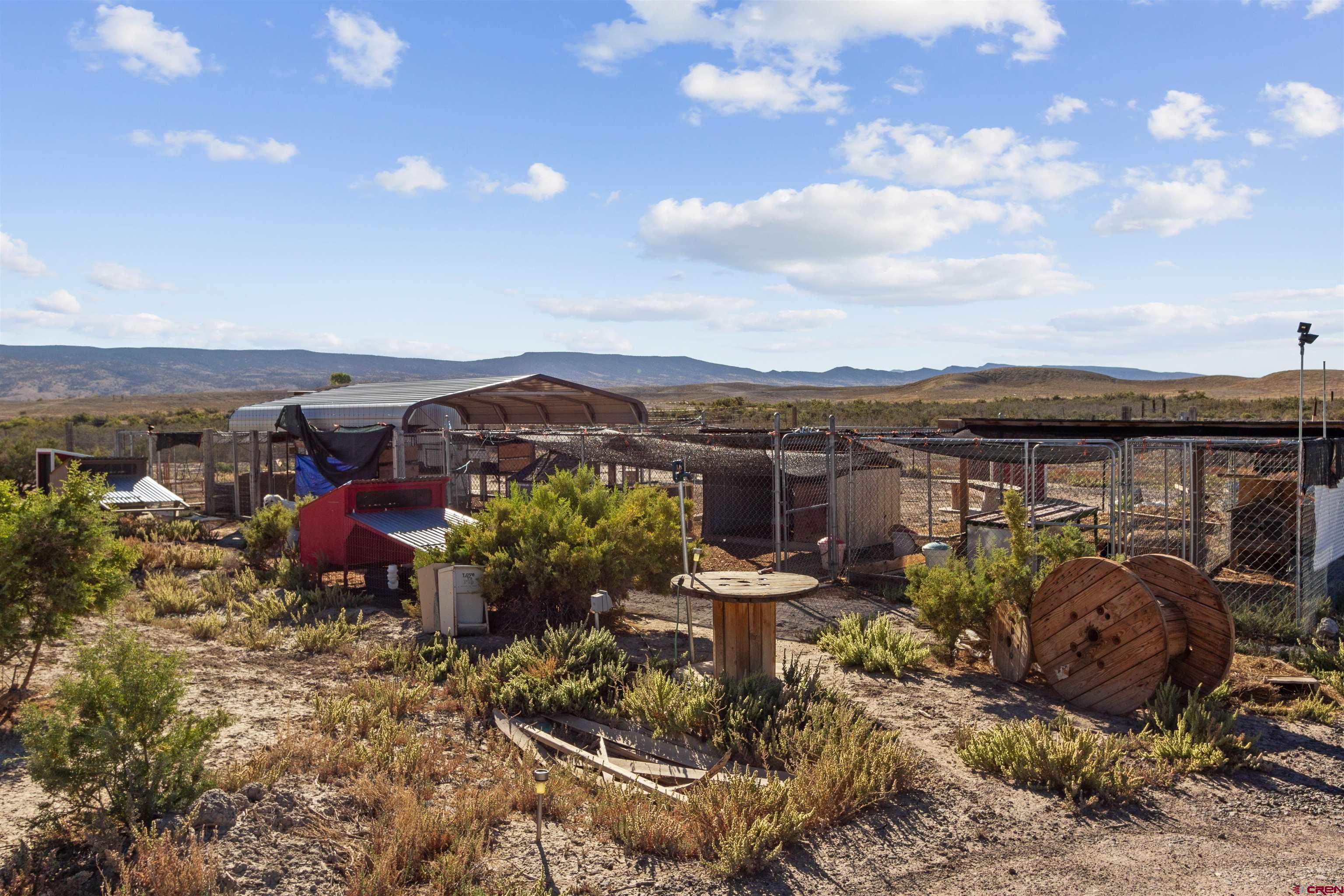 23384 D50 Road Delta, CO 81416 - Photo 35 of 37 a view of a chairs and table in a patio