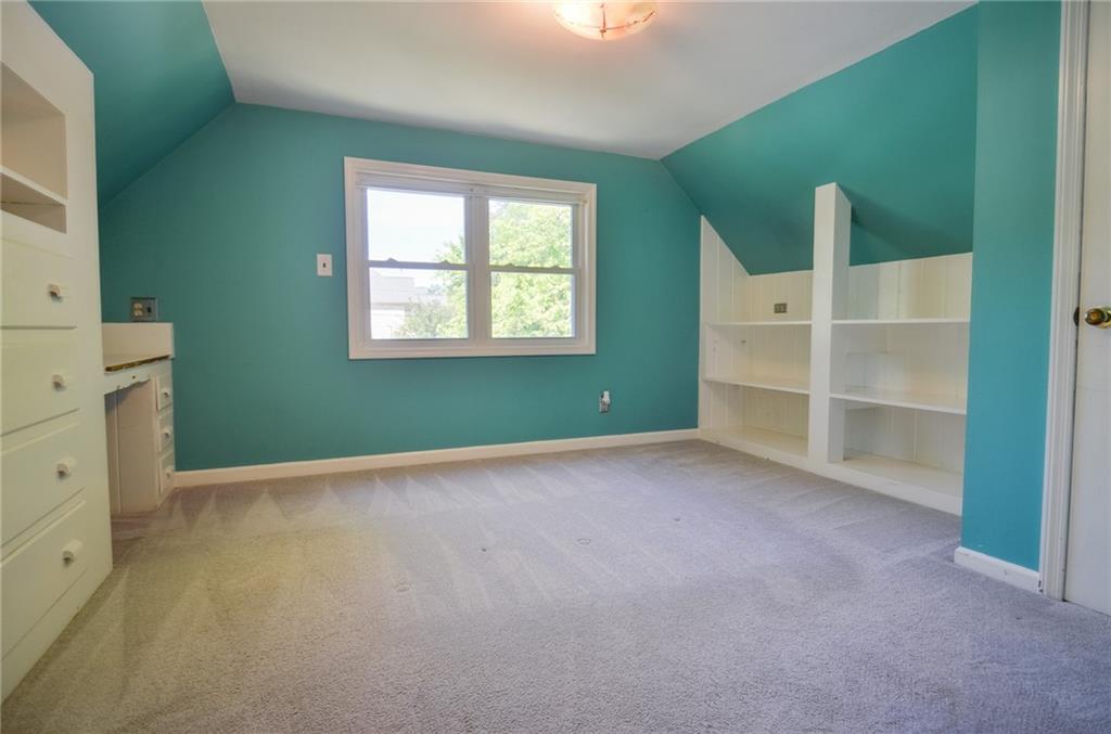 716 Killian Hill Road Southwest Lilburn, GA 30047 - Photo 37 of 56 a view of an empty room with a window