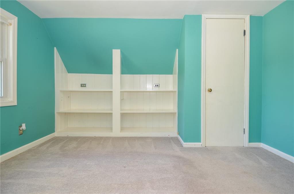 716 Killian Hill Road Southwest Lilburn, GA 30047 - Photo 39 of 56 a view of an empty room and a bathroom