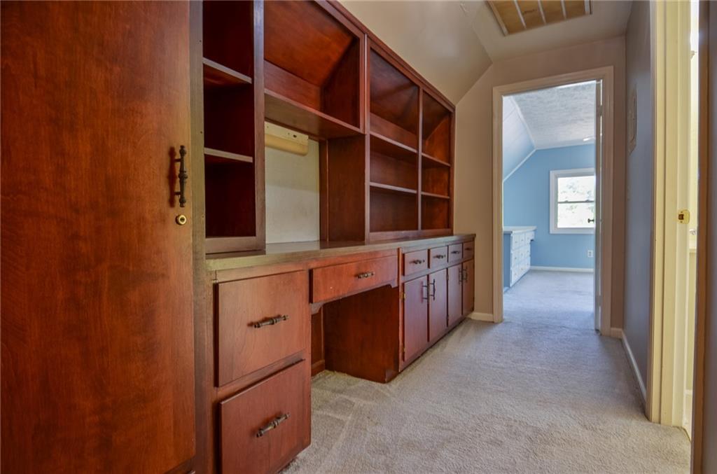 716 Killian Hill Road Southwest Lilburn, GA 30047 - Photo 41 of 56 a view of walk in closet