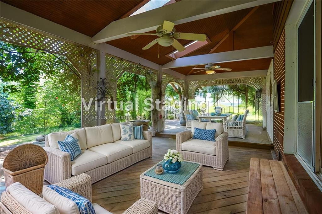 716 Killian Hill Road Southwest Lilburn, GA 30047 - Photo 50 of 56 a outdoor living space with furniture and garden view