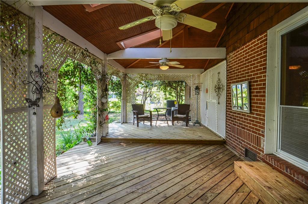 716 Killian Hill Road Southwest Lilburn, GA 30047 - Photo 52 of 56 a view of a patio with wooden floor