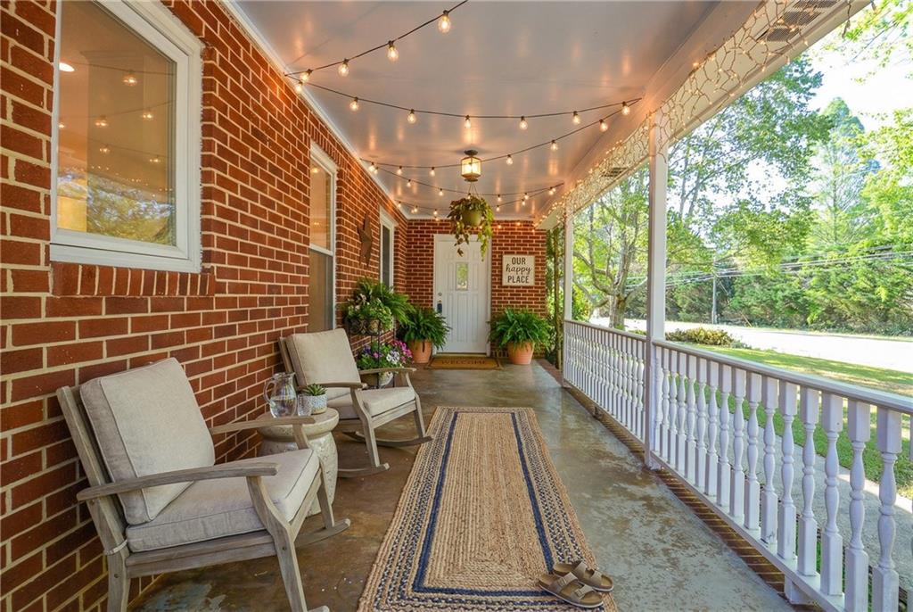 716 Killian Hill Road Southwest Lilburn, GA 30047 - Photo 7 of 56 a view of two chairs in balcony