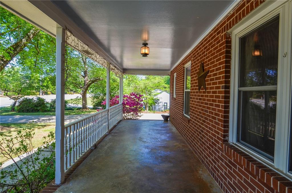 716 Killian Hill Road Southwest Lilburn, GA 30047 - Photo 9 of 56 a view of a porch