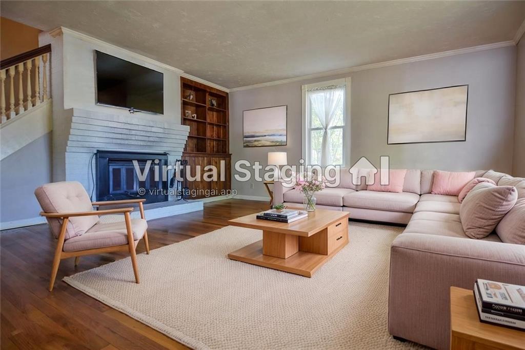 716 Killian Hill Road Southwest Lilburn, GA 30047 - Photo 10 of 56 a living room with furniture or fireplace and a flat screen tv