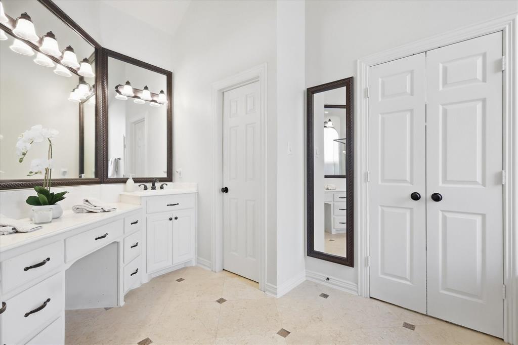 1447 Falls Road Coppell, TX 75019 - Photo 18 of 39 Neutral Primary Bathroom with Distinctive Elegance