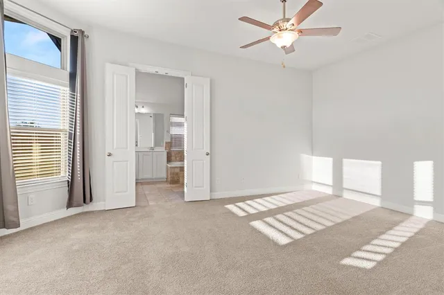 a bathroom with a sink vanity and a mirror