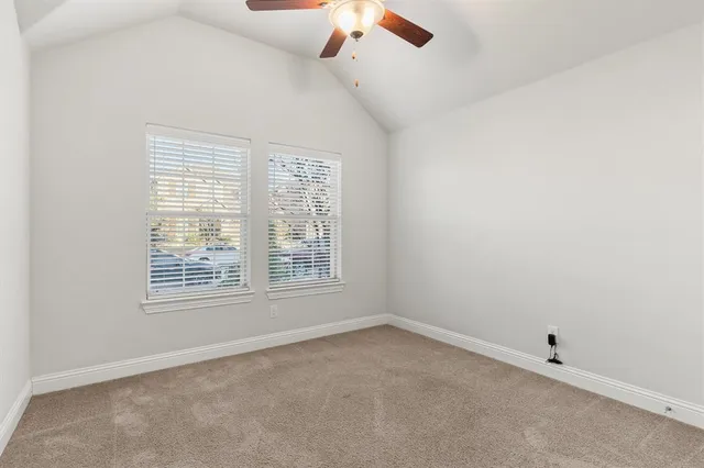 a bathroom with a double vanity sink toilet and shower