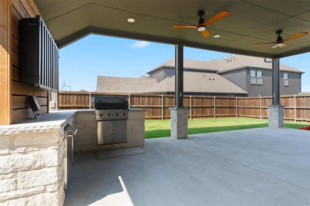 a view of a house with a backyard and porch
