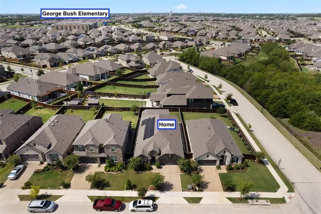 an aerial view of a house with a garden