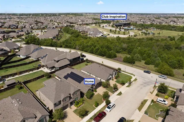 an aerial view of residential building with outdoor space
