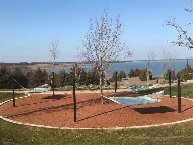 a view of a swimming pool and an outdoor space