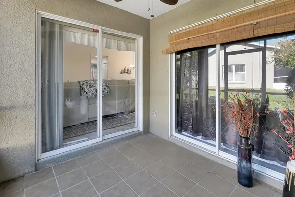 a view of empty room with floor to ceiling window