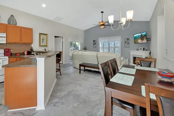 a view of a dining room with furniture