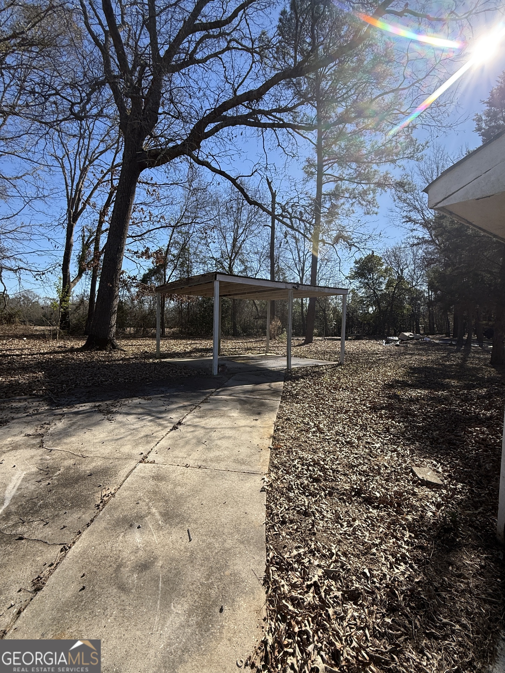 102 Canion Place Kathleen, GA 31047 - Photo 13 of 18 a backyard of a house with lots of green space