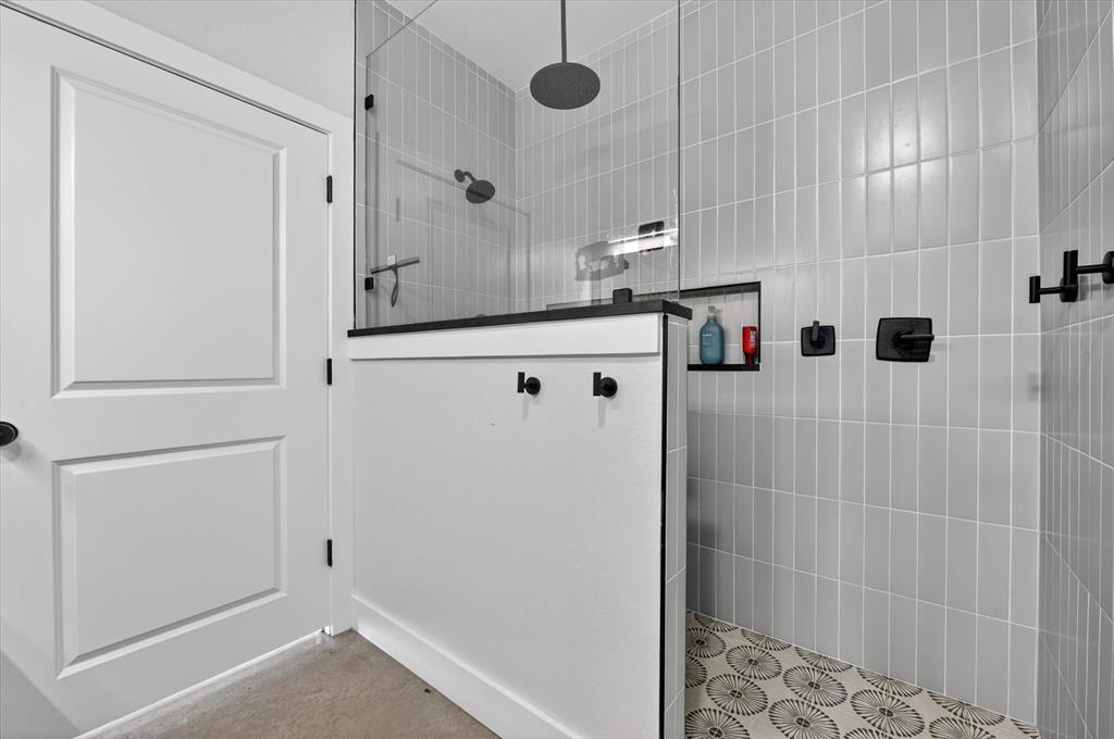 9082 Wolf Run Krum, TX 76249 - Photo 17 of 38 a bathroom with a shower