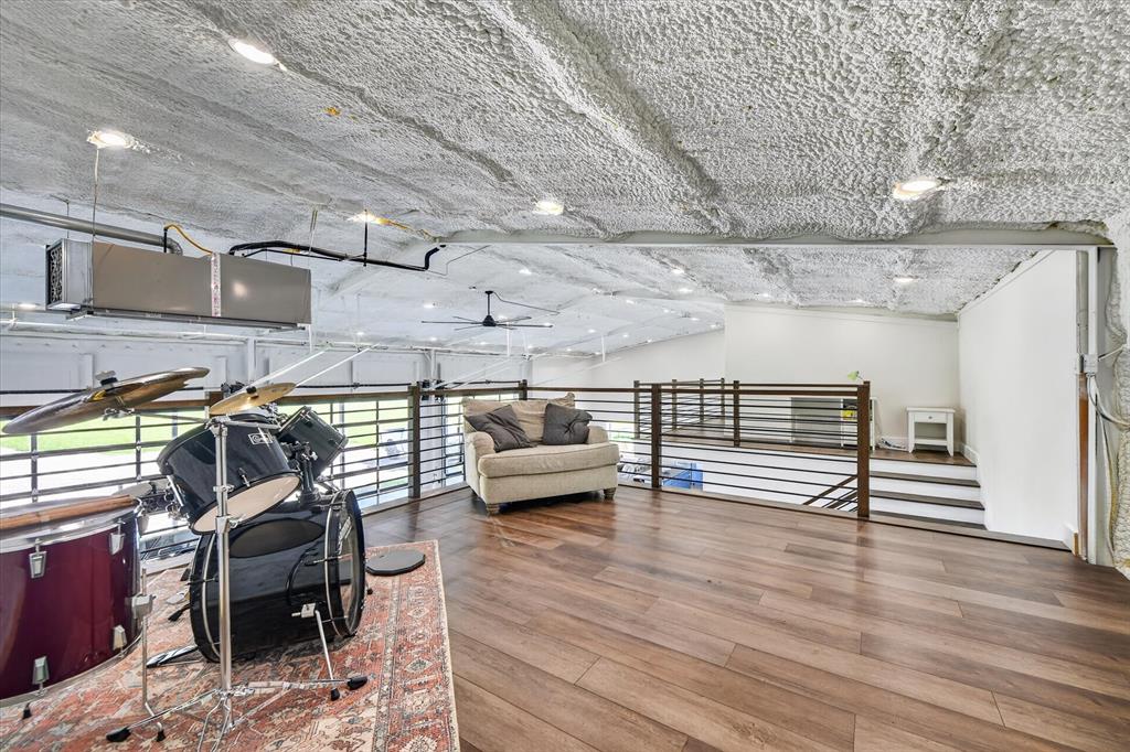 9082 Wolf Run Krum, TX 76249 - Photo 29 of 38 a view of an empty room with wooden floor